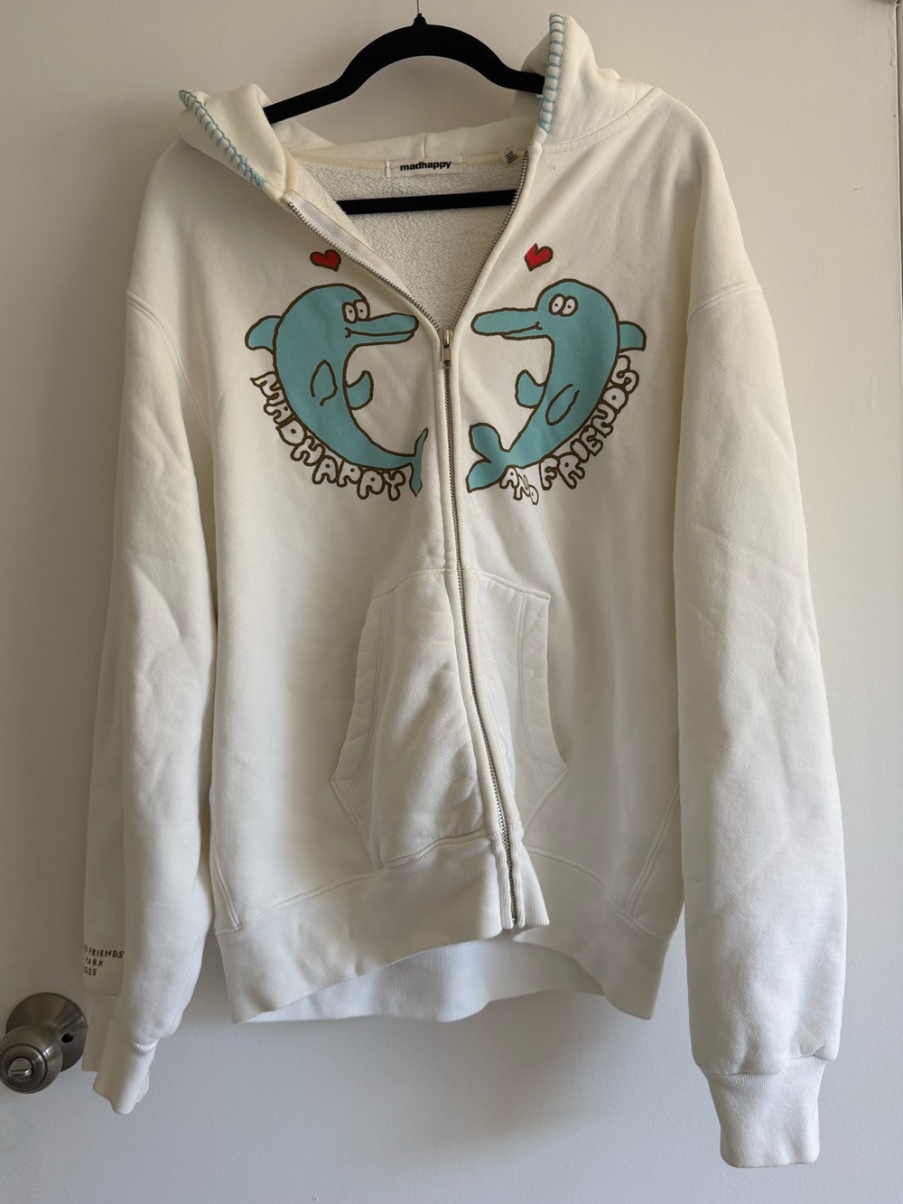 Madhappy Cream Full-Zip Hoodie with Blue Dolphin Graphics